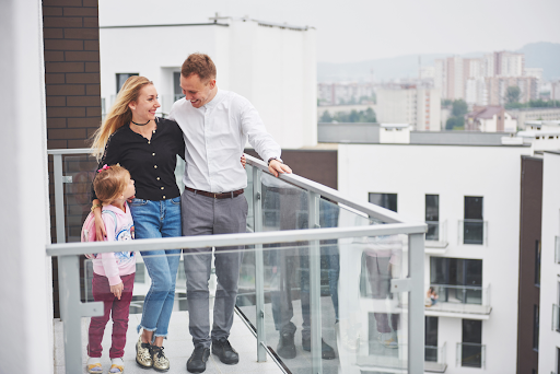 family on corporate housing deck